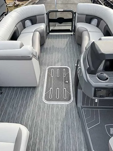 Slide: The Image of Interior of 2026 Premier Intrigue 230 RL with luxurious seating arrangement. - 7