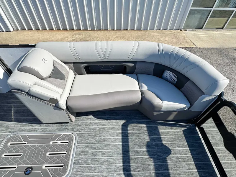 Slide: The Image of Luxurious seating in Premier Intrigue 230 RL pontoon boat, 2026 model. - 12