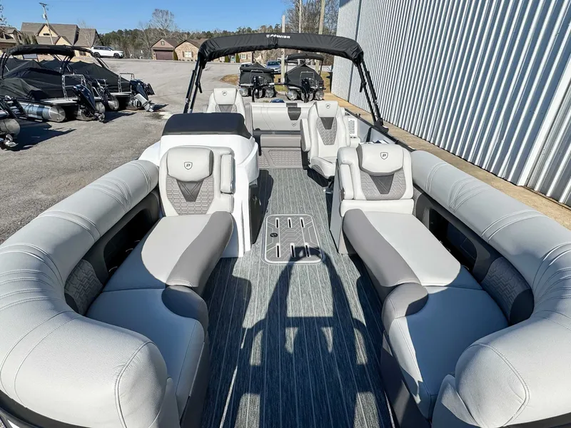 Slide: The Image of Interior view of 2026 Premier Intrigue 230 RL pontoon boat. - 14