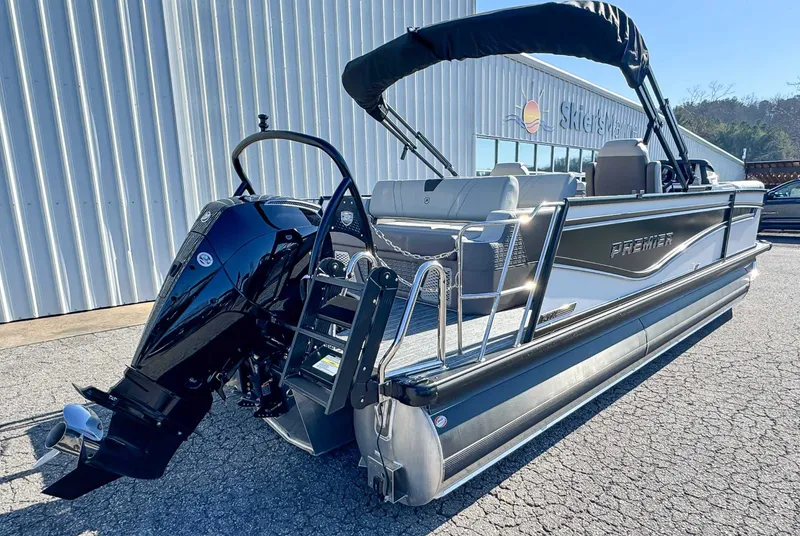 Slide: The Image of 2026 Premier Intrigue 230 RL pontoon boat with outboard motor. - 8