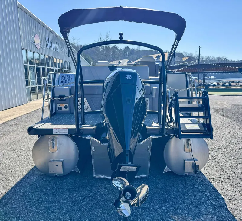 Slide: The Image of 2026 Premier Intrigue 230 RL pontoon boat rear view. - 9