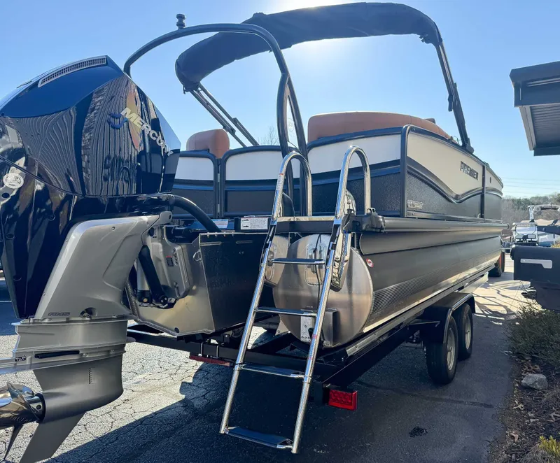 Slide: The Image of 2026 Premier Solaris 230 RF boat with outboard motor and ladder. - 5