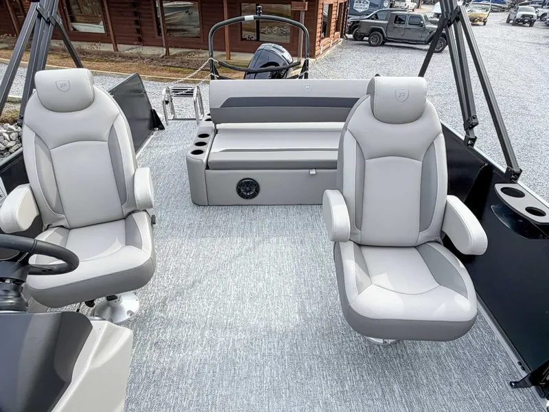 Slide: The Image of Interior of 2026 Premier Sunscape 220 RL with luxurious seating. - 13