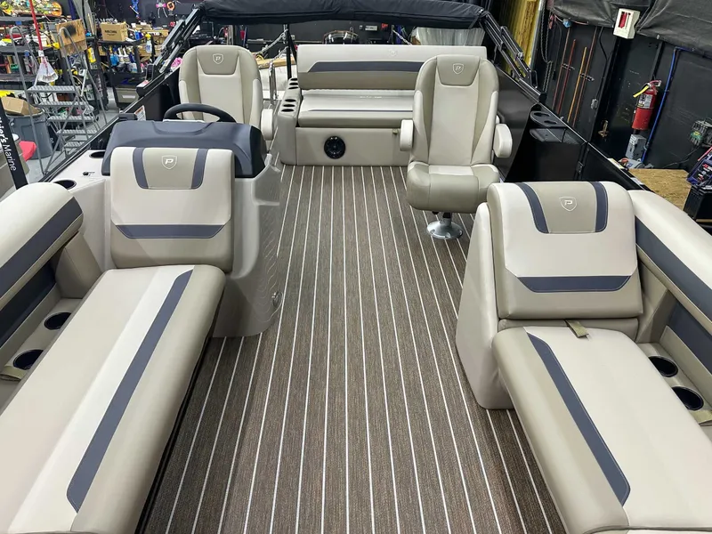 Slide: The Image of Interior of 2026 Premier Sunscape 220 RL with luxurious seating. - 10
