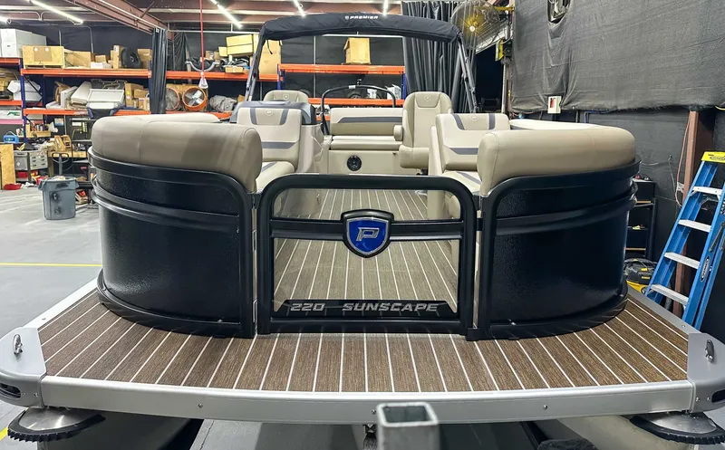 Slide: The Image of 2026 Premier Sunscape 220 RL pontoon boat in warehouse. - 4