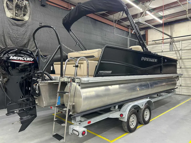 Slide: The Image of 2026 Premier Sunscape 220 RL pontoon boat in warehouse. - 5