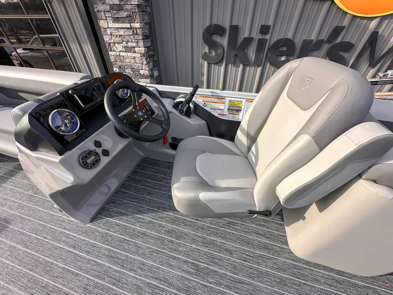 Slide: The Image of Interior of 2026 Premier Sunscape 220 RF (25 PTX) with helm console. - 13