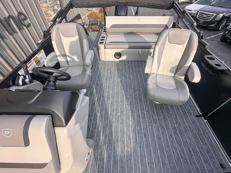 Slide: The Image of Interior of 2026 Premier Sunscape 220 RL with gray seating. - 11
