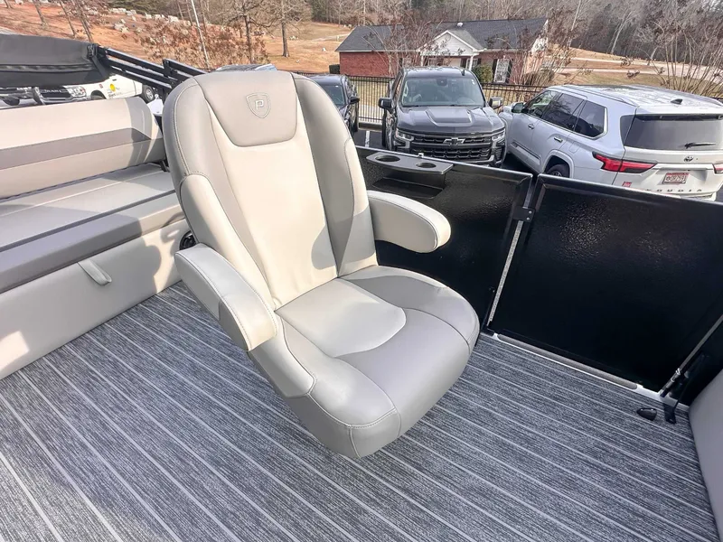 Slide: The Image of Luxurious seating in Premier Sunscape 220 RL pontoon boat, 2026 model. - 12