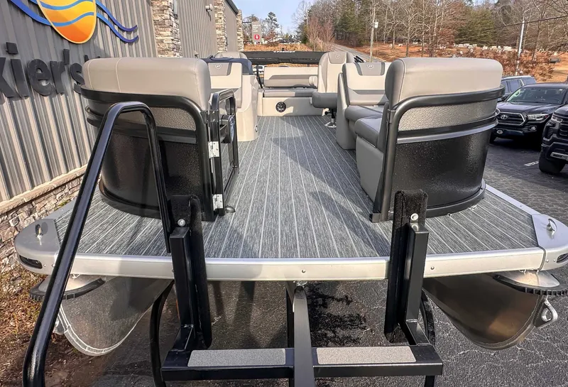 Slide: The Image of Premier Sunscape 220 RL 2026 pontoon boat with gray seating and modern design. - 4