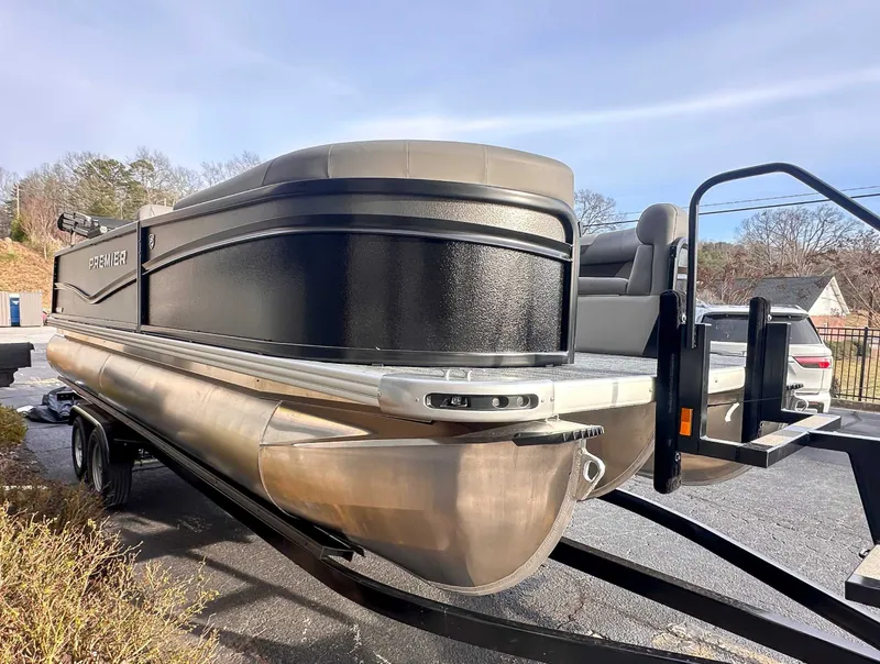 Slide: The Image of 2026 Premier Sunscape 220 RL pontoon boat on trailer. - 5