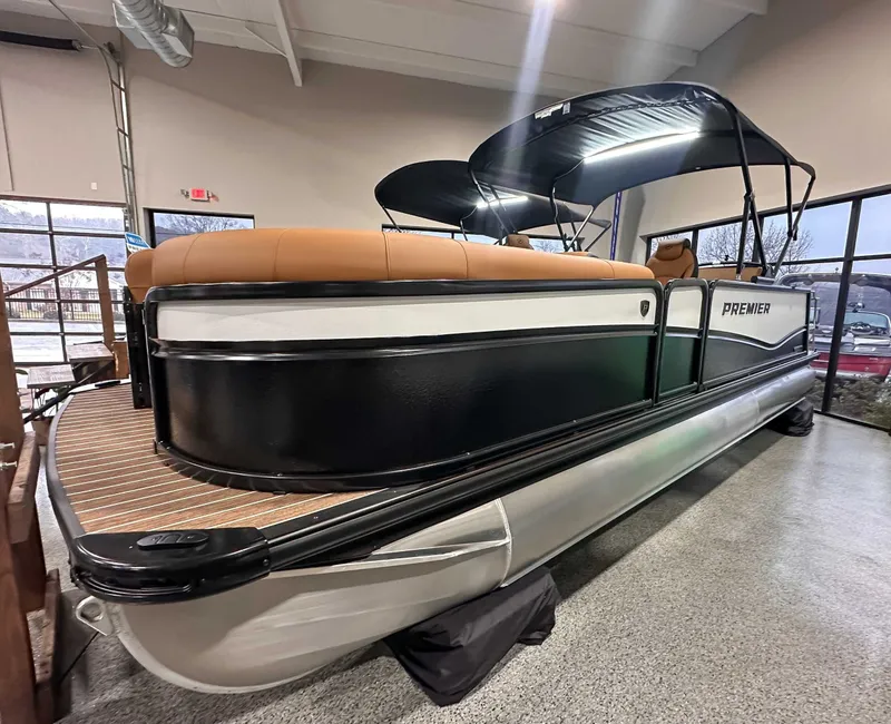 The Image of 2026 Premier Sunsation 230 RL pontoon boat in showroom. - 1