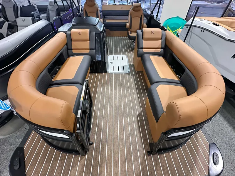 Slide: The Image of Interior of Premier Sunsation 230 RL pontoon boat, luxurious seating, 2026 model. - 10