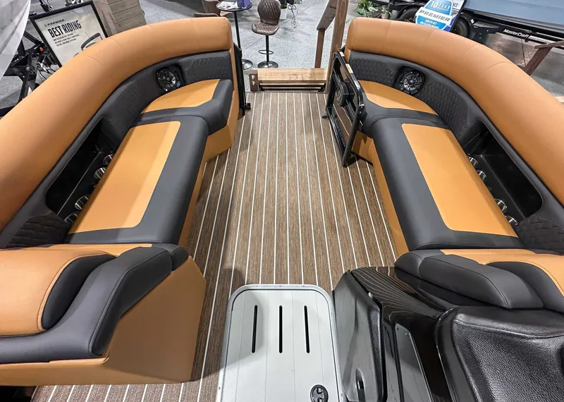 Slide: The Image of Interior of 2026 Premier Sunsation 230 RL with luxurious seating. - 9
