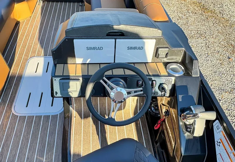 Slide: The Image of 2026 Premier Solaris 250 RL helm with Simrad displays. - 16
