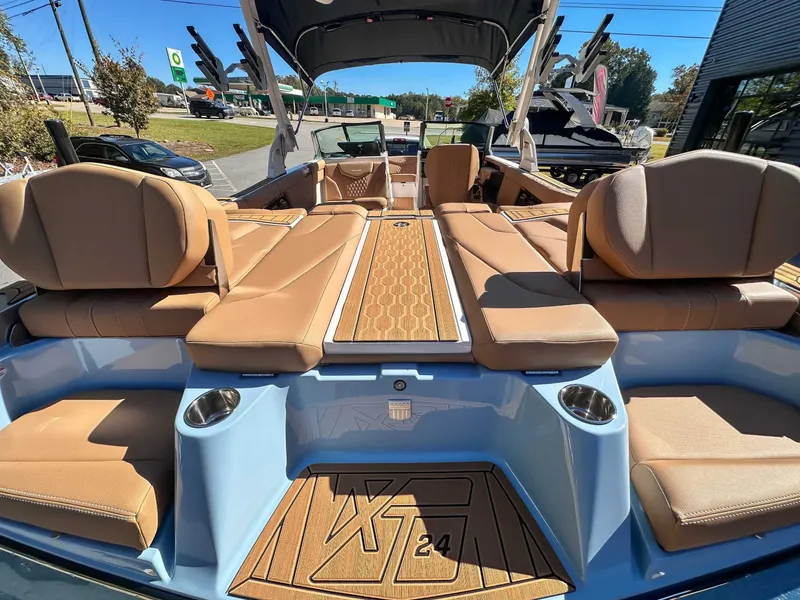 Slide: The Image of 2026 MasterCraft XT24 with luxurious interior and stylish design. - 11