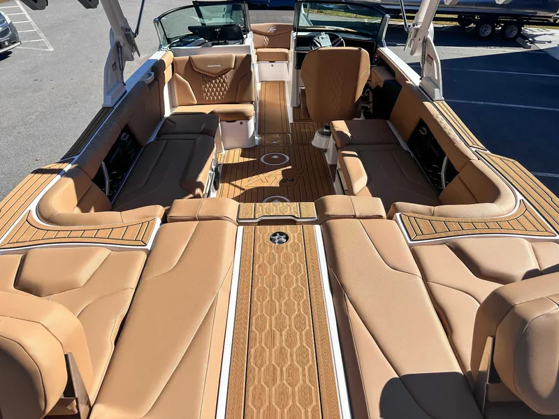 Slide: The Image of Interior of 2026 MasterCraft XT24 boat with luxurious seating. - 12