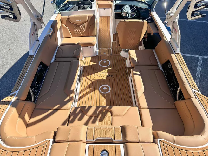 Slide: The Image of Interior of 2026 MasterCraft XT24 with luxurious leather seating. - 13