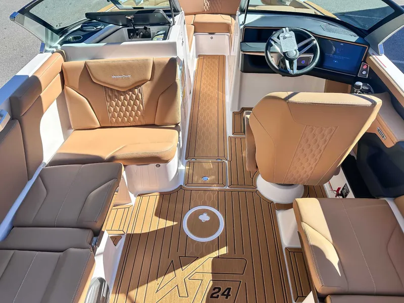 Slide: The Image of Interior of 2026 MasterCraft XT24 with luxurious leather seating. - 14