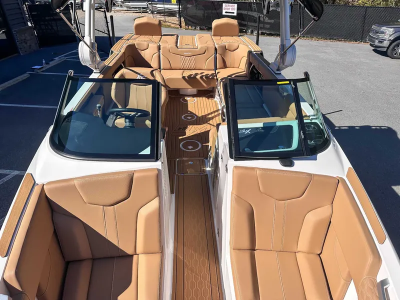 Slide: The Image of Interior of 2026 MasterCraft XT24 with luxurious leather seating. - 17