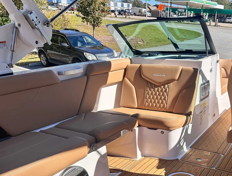 Slide: The Image of Interior of 2026 MasterCraft XT24 boat with luxurious seating. - 19