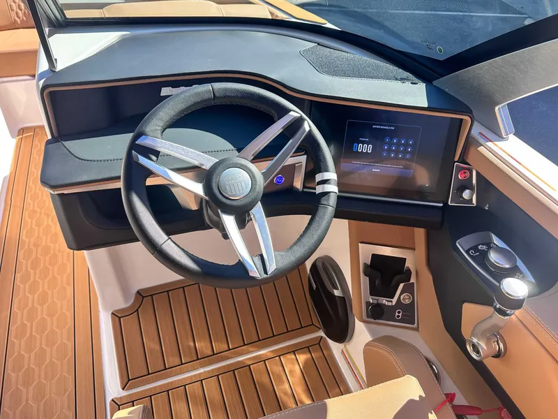 Slide: The Image of Interior of 2026 MasterCraft XT24 with modern dashboard. - 21