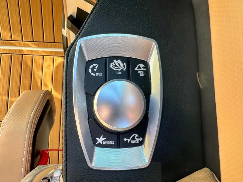 Slide: The Image of Control panel of 2026 MasterCraft XT24 with various controls. - 23