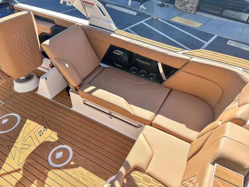 Slide: The Image of Interior of 2026 MasterCraft XT24 with luxurious leather seating. - 25