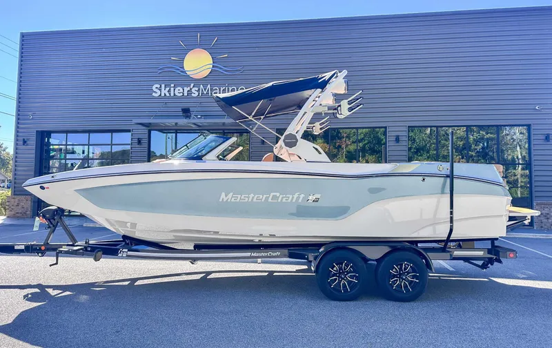 Slide: The Image of 2026 MasterCraft XT24 boat in front of Skier's Marine building. - 6