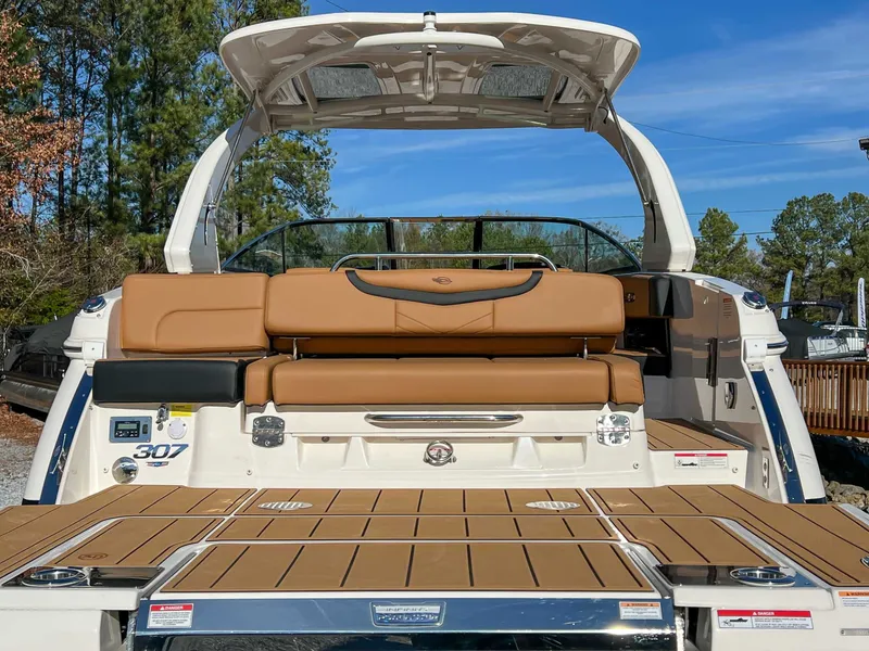 Slide: The Image of 2024 Chaparral 307 SSX boat with luxurious seating area. - 13