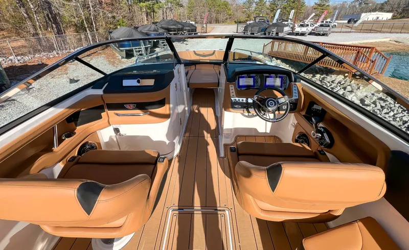 Slide: The Image of Interior of 2024 Chaparral 307 SSX with luxurious leather seating. - 17