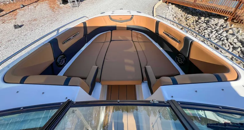 Slide: The Image of 2024 Chaparral 307 SSX interior with luxurious seating. - 19