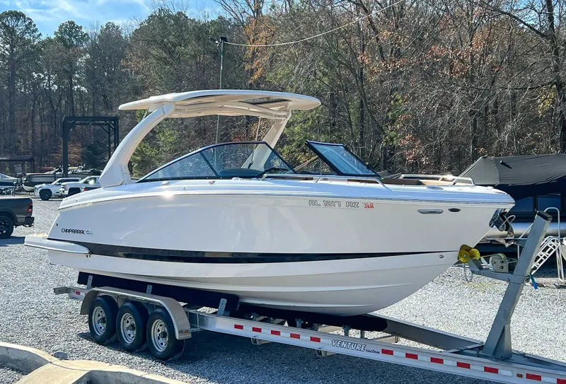 Slide: The Image of 2024 Chaparral 307 SSX boat on trailer outdoors. - 5