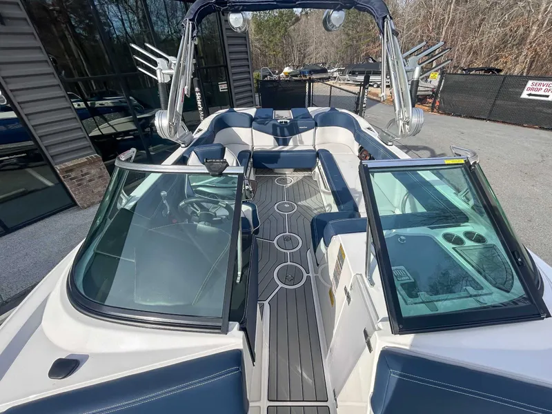 Slide: The Image of Interior view of a 2020 MasterCraft XT23 boat with modern seating. - 13