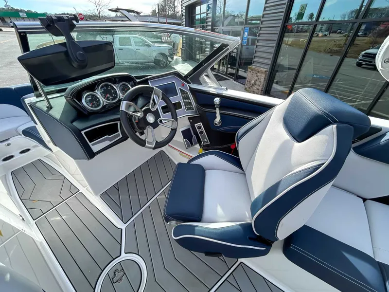Slide: The Image of Interior of a 2020 MasterCraft XT23 boat with modern dashboard. - 15