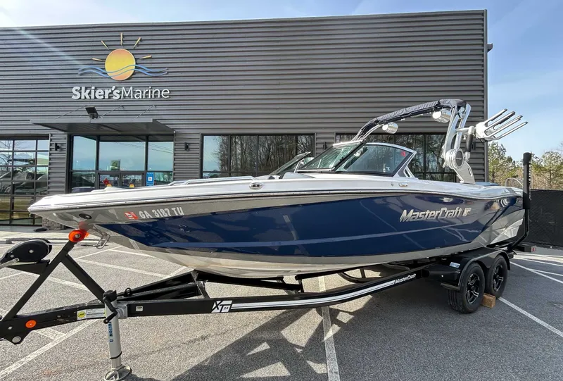 Slide: The Image of 2020 MasterCraft XT23 boat outside Skier's Marine store. - 4
