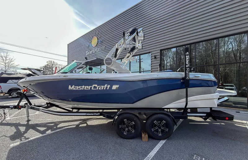 Slide: The Image of 2020 MasterCraft XT23 boat outside Skier's Marine building. - 5