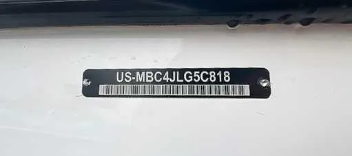 Slide: The Image of Serial number plate of a 2018 MasterCraft XT22 boat. - 20