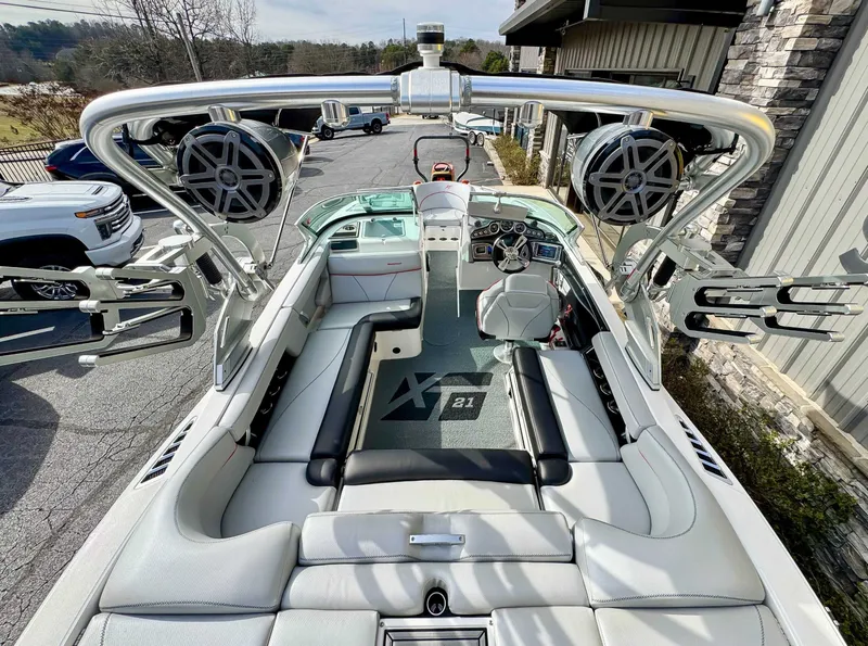 Slide: The Image of Interior of a 2017 MasterCraft XT21 boat with luxurious features. - 10