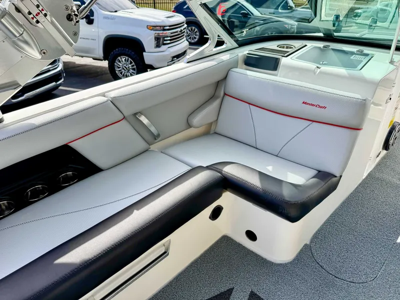 Slide: The Image of Interior of a 2017 MasterCraft XT21 boat with white seating. - 14