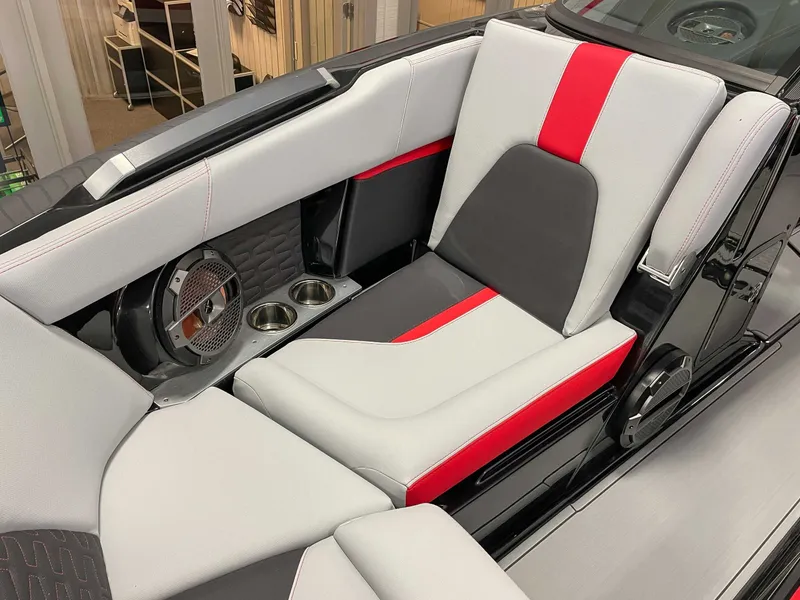 Slide: The Image of Interior of 2022 MasterCraft X22 with modern seating and speakers. - 12