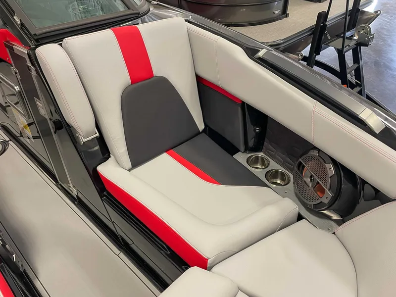 Slide: The Image of Interior of 2022 MasterCraft X22 with gray and red seating. - 13