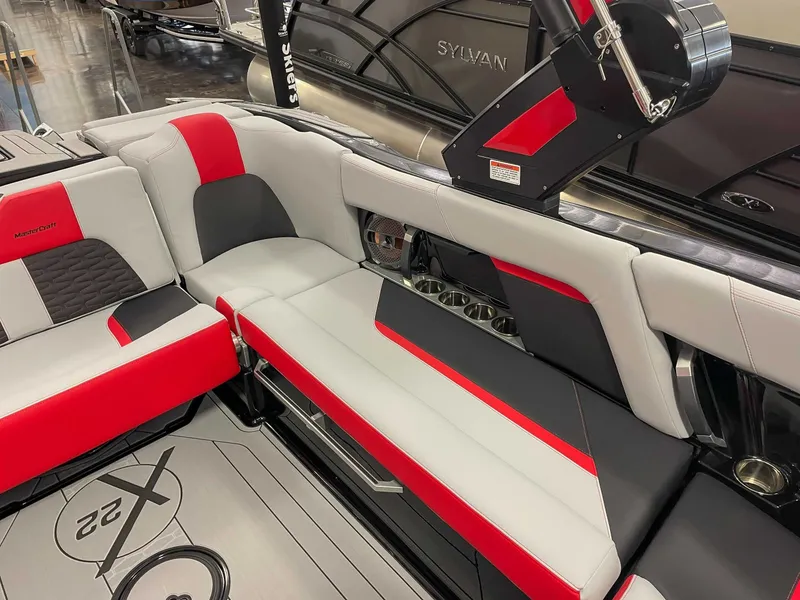 Slide: The Image of Interior of 2022 MasterCraft X22 with stylish seating. - 18