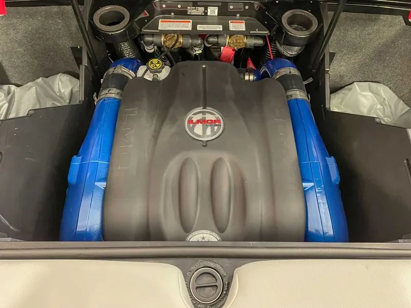 Slide: The Image of Engine compartment of a 2022 MasterCraft X22 boat. - 21