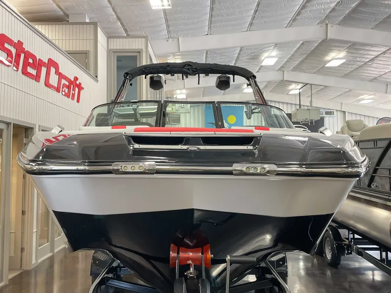 Slide: The Image of 2022 MasterCraft X22 boat in a showroom. - 3