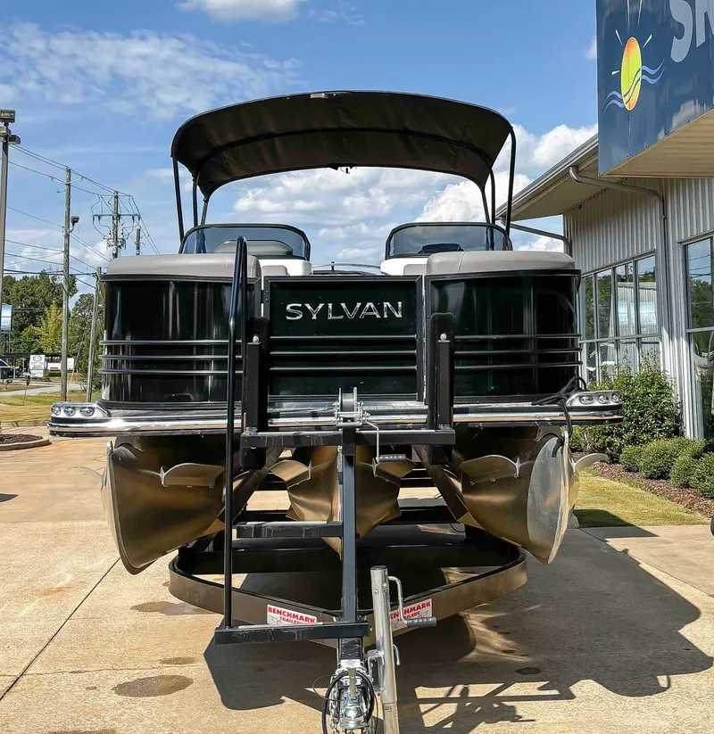 Slide: The Image of 2021 Sylvan S5 LZ DC pontoon boat on trailer outside building. - 4