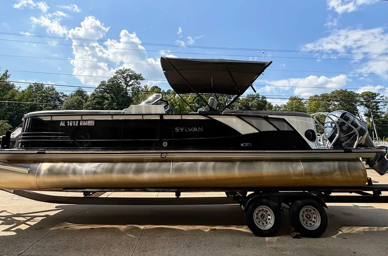 Slide: The Image of 2021 Sylvan S5 LZ DC pontoon boat on trailer, sunny day. - 6