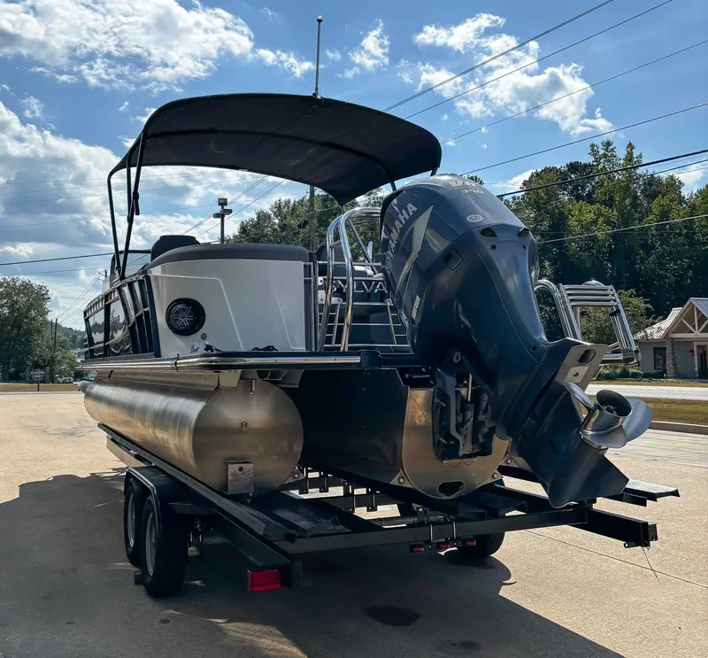 Slide: The Image of 2021 Sylvan S5 LZ DC pontoon boat on trailer, sunny day. - 7