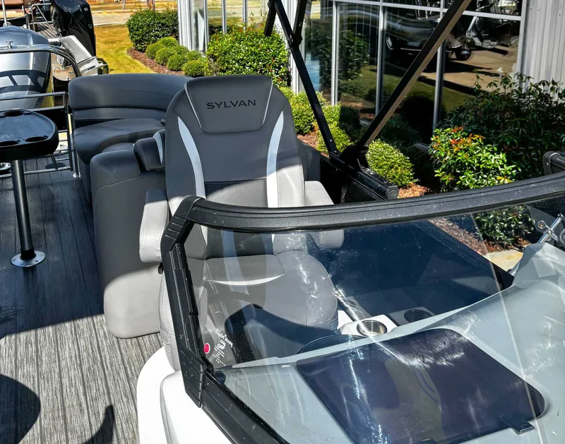Slide: The Image of Sylvan S5 LZ DC 2021 boat with gray seats and windshield. - 9