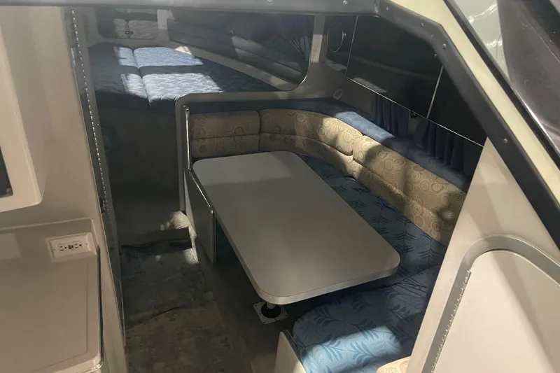 Slide: The Image of 1992 Chaparral Signature 30 interior with dining area and sleeping quarters. - 19